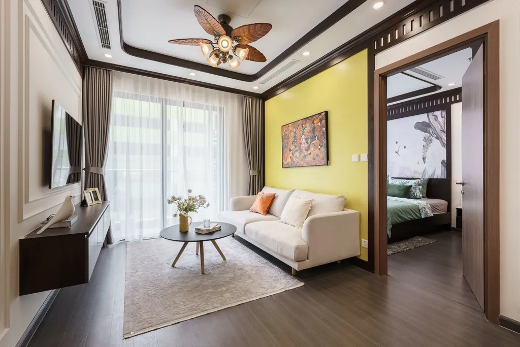 Hoàn thiện nội thất phòng khách Căn hộ mẫu 2 phòng ngủ phong cách Indochine (Đông Dương)