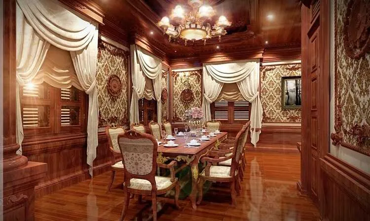 Bàn ăn và ốp tường gỗ hương chế tác khéo léo theo phong cách tân cổ điển dành cho căn biệt thự sang trọng.