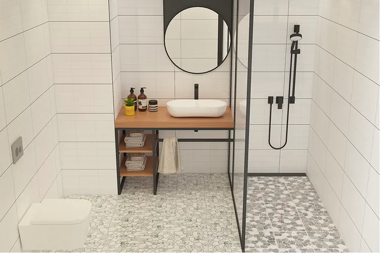 Chọn thiết bị vệ sinh như bồn rửa mặt nhỏ, bồn cầu treo tường cùng vách ngăn kính để tiết kiệm không gian cho phòng tắm 4m2