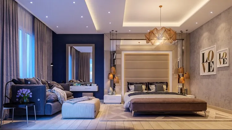 Phòng ngủ master hiện đại phân chia hai khu vực rõ rệt với cách dùng ánh sáng và phối màu riêng biệt: bên trái là bàn tiếp khách, bàn trang điểm dùng tông màu lạnh, bên phải là giường với tông màu ấm tạo nên sự độc đáo, ấn tượng.