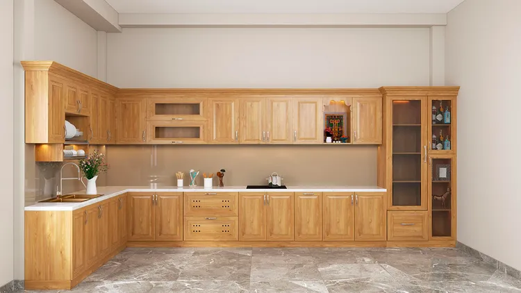 Mẫu tủ bếp chữ L từ chất liệu gỗ tự nhiên, với các vân gỗ mang đến cảm giác gần gũi và thoải mái cho gia chủ.