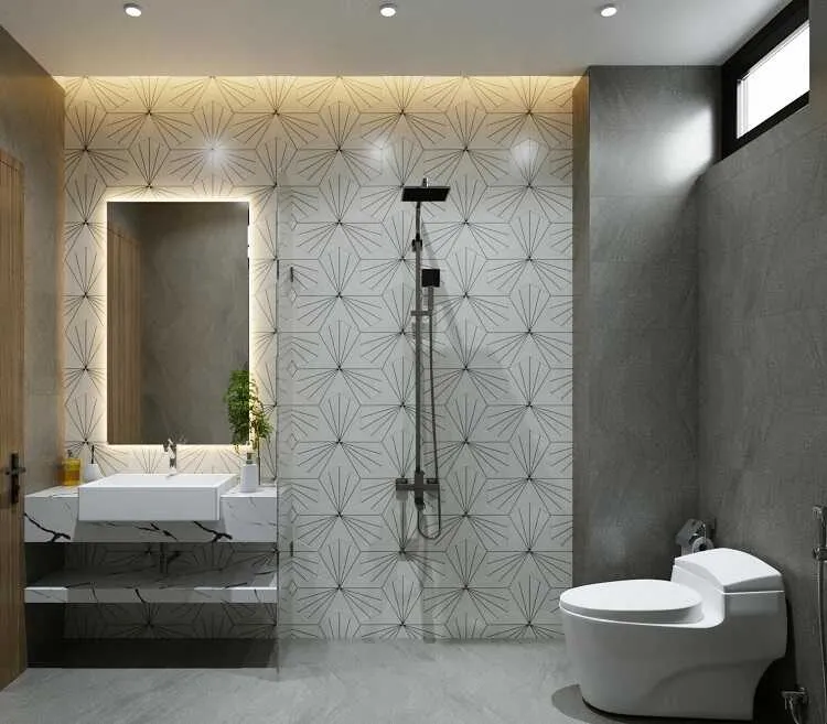 Phòng tắm ấn tượng hơn với gạch ốp màu trắng điểm các hoa văn tạo nên từ các đường kẻ đơn giản.