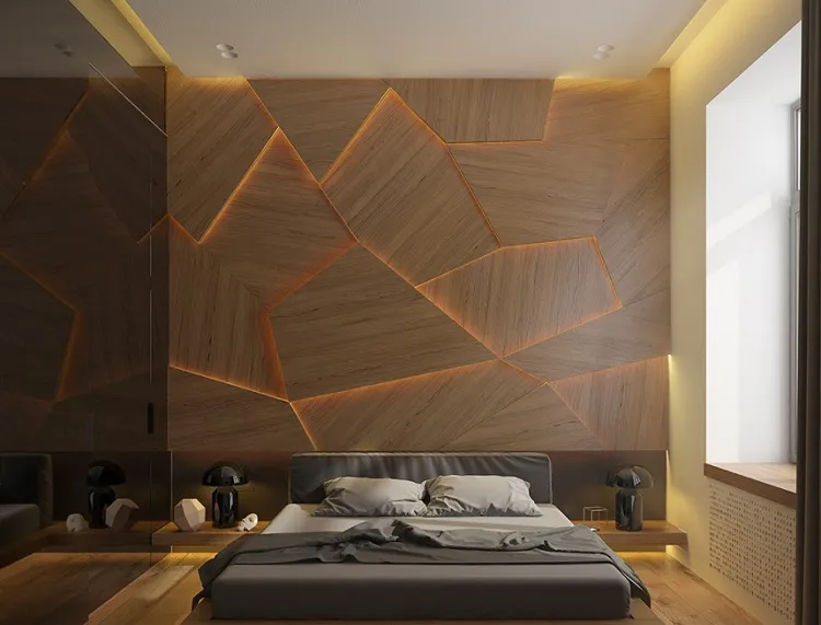 Tấm ốp nhựa vân gỗ kết hợp với hiệu ứng đèn độc đáo mang tới vẻ đẹp mới lạ cho phòng ngủ.