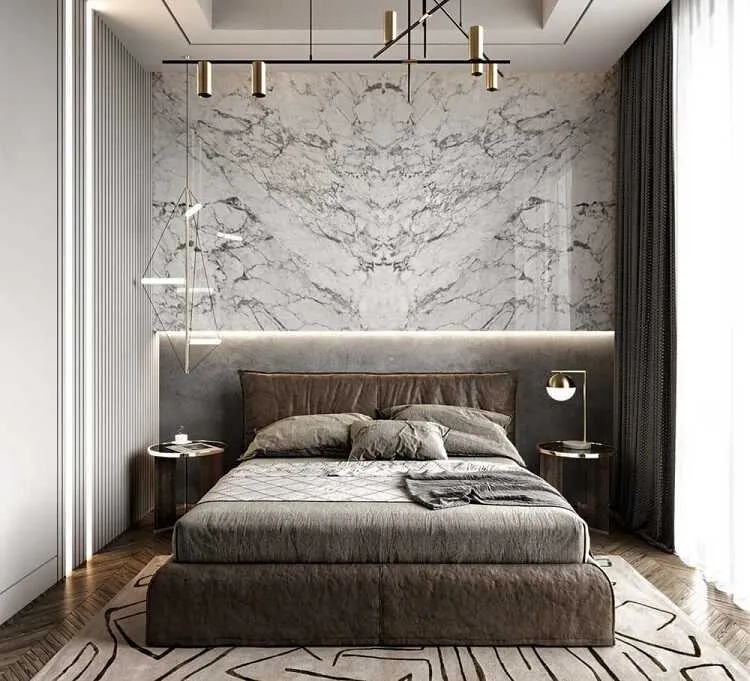 Đá ốp tường màu xám phối hợp với màu nâu của giường, sàn và rèm cửa