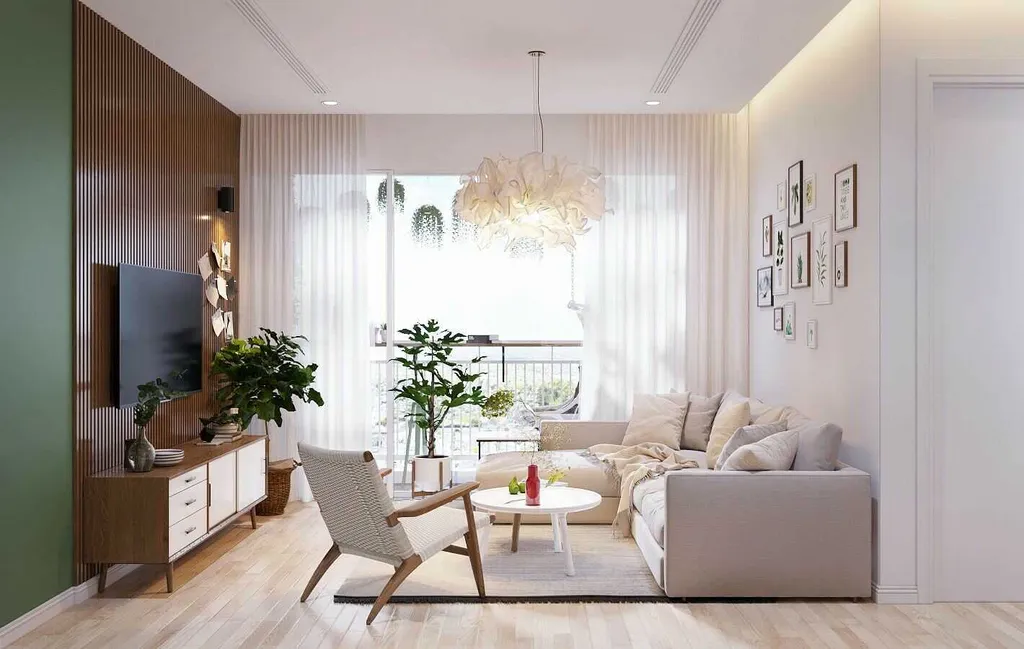 Phòng khách nổi bật với gam tường trắng, nội thất gỗ cùng tông màu trang nhã làm bật lên phong cách sống năng động, hiện đại của chủ nhân