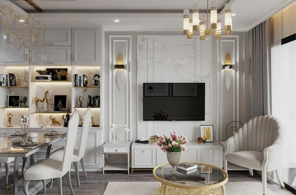 Phòng khách theo phong cách tân cổ điển được nhấn nhá bằng các chi tiết tường, đèn, nội thất trang trí, toát lên sự sang trọng, ấm cúng và đẳng cấp của căn hộ 