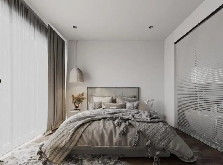 Phòng ngủ đôi theo phong cách Bắc Âu với màu xám và trắng chủ đạo.
