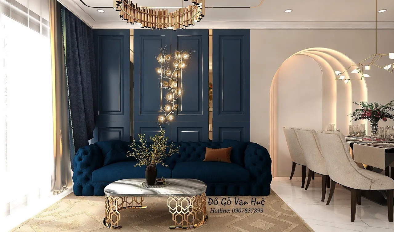 Công ty Đồ Gỗ Vạn Huệ bố trí bộ ghế sofa xanh coban tạo điểm nhất cho tổng thể không gian phòng khách
