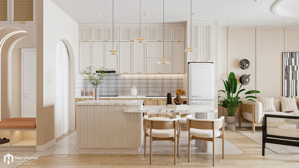 Khu vực bếp tiện nghi là điểm kết nối toàn bộ các hoạt động của căn nhà. Gian bếp và bàn ăn được thiết kế tinh gọn, hiện đại với tinh thần “vừa đủ” nhưng không chiếm dụng quá nhiều không gian