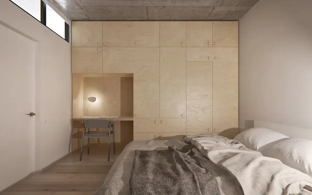 Không gian khu vực phòng ngủ ở mẫu thiết kế căn hộ 1 phòng ngủ theo phong cách tối giản 