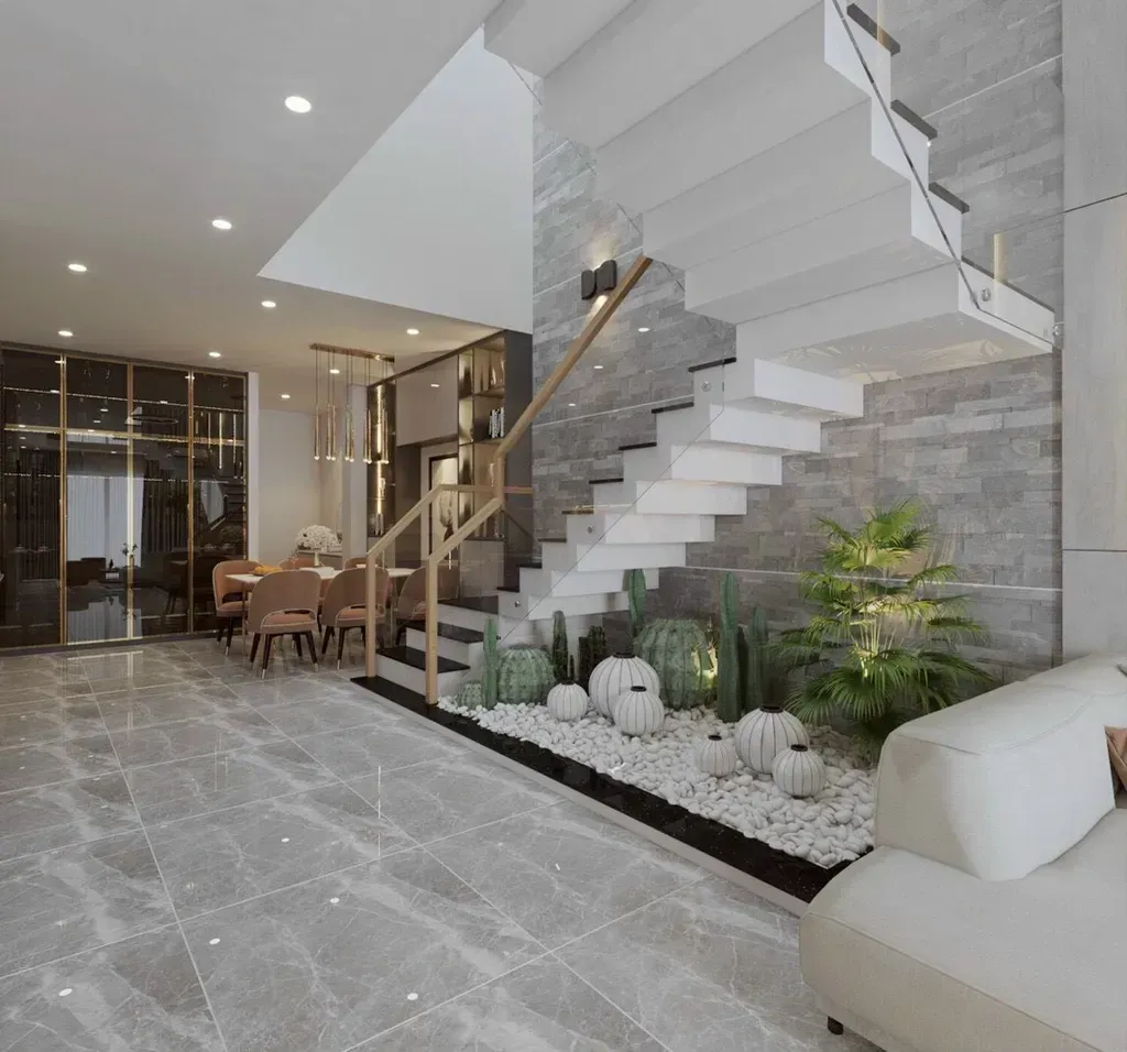 Tay vịn cầu thang kính cường lực kết hợp gỗ, mang đến vẻ đẹp sang trọng và mở rộng không gian cho nhà phố hiện đại.