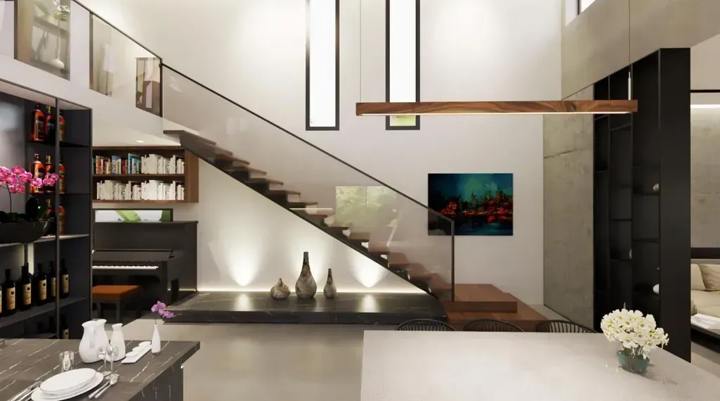 Tay vịn cầu thang kính tạo cảm giác bay bổng, tinh tế và dễ dàng vệ sinh, giữ cho không gian luôn sáng sủa.
