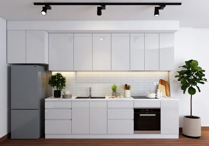 Tủ bếp acrylic toàn bộ được sử dụng màu trắng để tạo sự tinh tế cho không gian