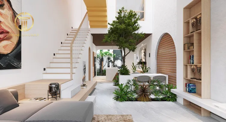 Phòng khách nhà ống 5m có cầu thang hiện đại có lối thiết kế mới lạ khi tạo một sân vườn mini trong không gian phòng khách.