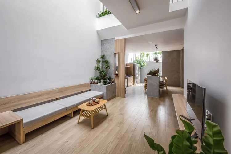 Phòng khách theo phong cách Nhật Bản dùng màu xám và nâu gỗ, chất liệu chính là gỗ, bê tông nhẹ nhàng, thư giãn, gần gũi với thiên nhiên.