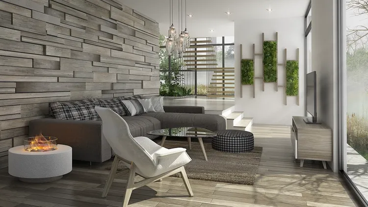 Phòng khách nhà ống được thiết kế theo phong cách Scandinavian, với một bộ sofa màu xám và các phụ kiện trang trí tinh tế.