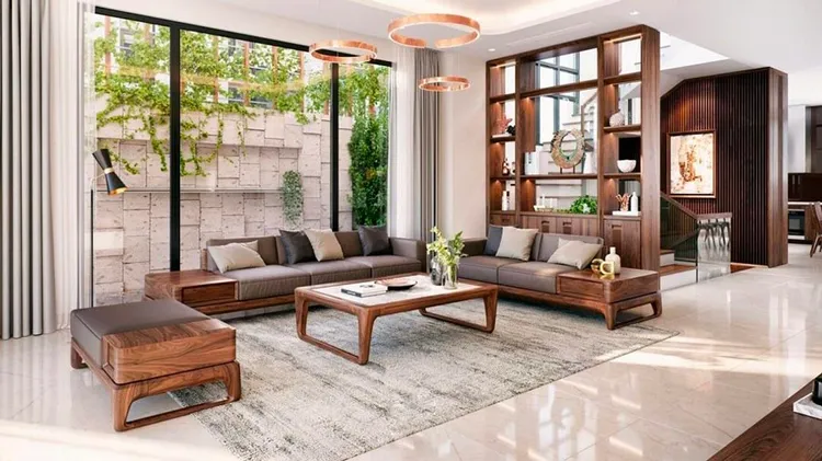 Phòng khách trong nhà ống 5m hiện đại được thiết kế với nội thất bằng chất liệu gỗ, từ sofa, bàn trà, tủ rượu cho đến cầu thang tạo nên không gian sống sang trọng và đẳng cấp.